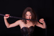 © murika - Woman with a whip in her hand