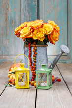 Bouquet Of Orange Roses In Silver Watering Can
