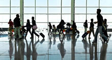 A Large Group Of Arriving Passengers. Panorama. Airport.