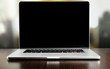 © Africa Studio - Laptop with blank screen on light background