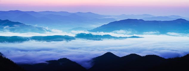 Wall Mural - Mountain foggy sunrise