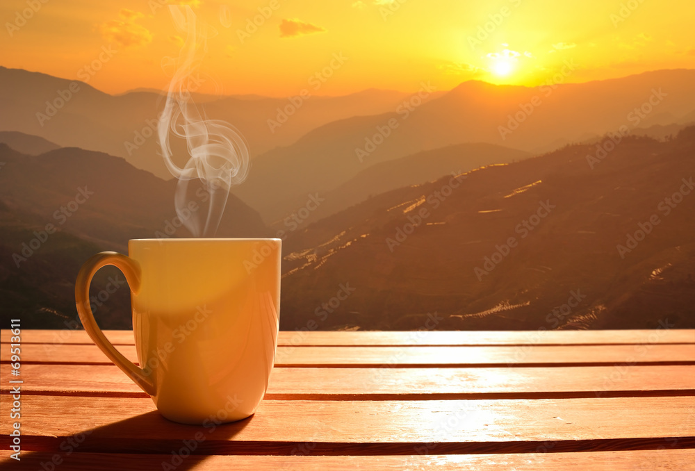 Morning cup of coffee with mountain background at sunrise - obrazy, fototapety, plakaty 