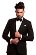 © Viorel Sima - stylish man in elegant black suit and bowtie