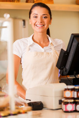 Wall Mural - Cheerful cashier.