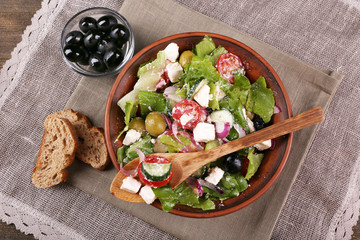 Wall Mural - Bowl of Greek salad served