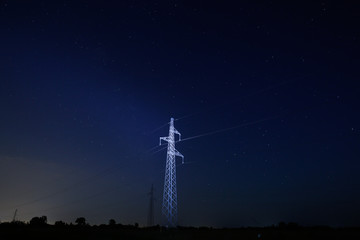 Pylon under starry sky