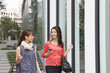 © Monet - Modern building , Two young women