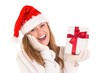 © WavebreakMediaMicro - Festive blonde holding a gift
