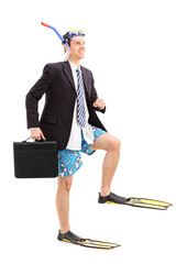 Poster - Businessman walking with scuba fins