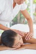 © WavebreakmediaMicro - Beautiful brunette enjoying a massage