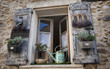 window in France with dried lavendar and herbs