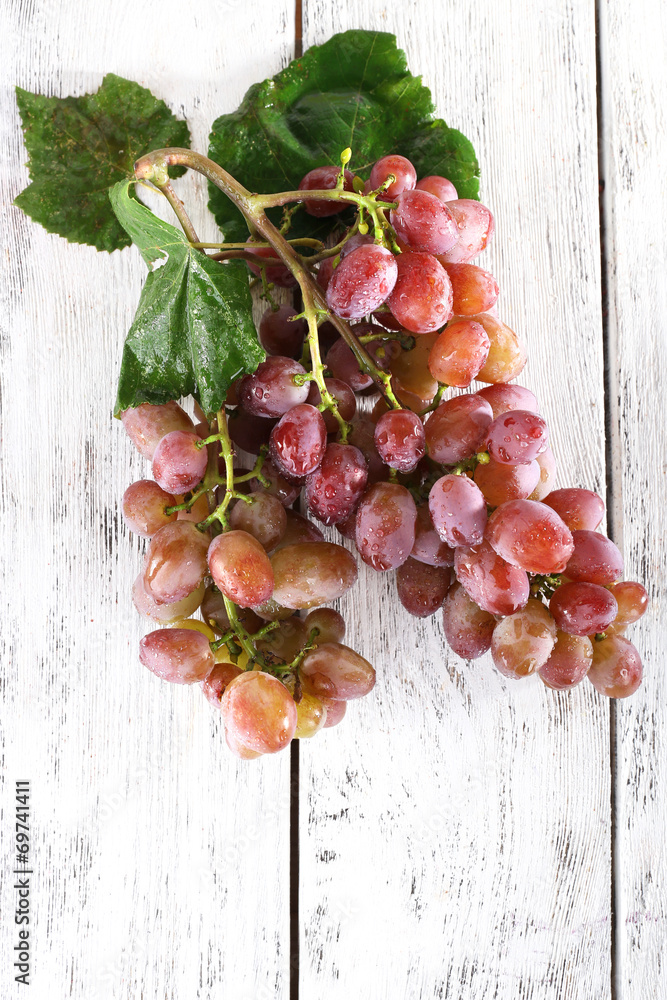 Bunch of grape on wooden background