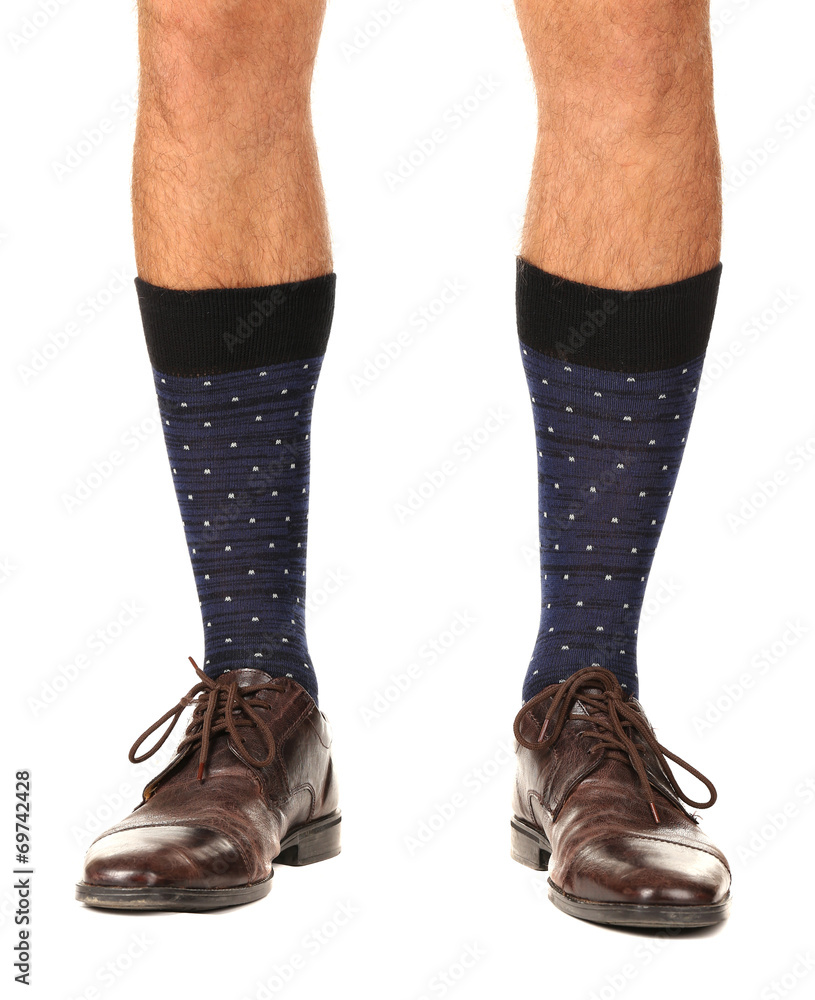 Man leg in suit and colorful socks, isolated on white