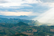 Sun rays shining down on hills in San Marino