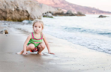 portrait of cute little girl playing