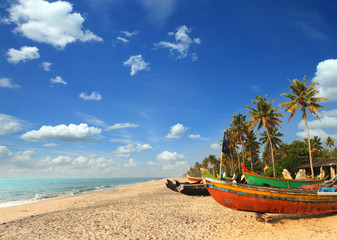 Wall Mural - old fishing boats on beach in india