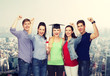 © Syda Productions - group of standing smiling students with diploma