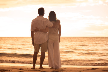 Wall Mural - Mature Couple Enjoying Sunset