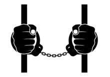 Human Hands In Handcuffs
