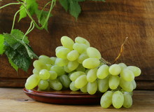 Fresh Organic Green Grapes On A Wooden Table