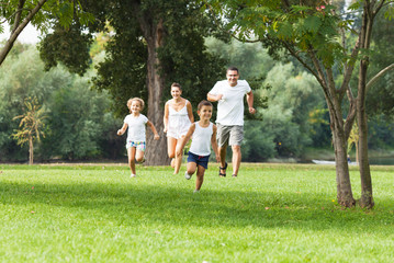 Familly is having fun in a park