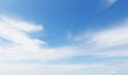Wall Mural - fantastic soft white clouds against blue sky
