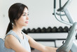 © siraphol - Woman workout at fitness