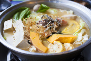 japanese and asian cuisine. hot pot on background