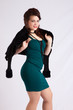 © Allen Penton - Woman in green dress and black jacket