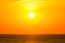 Orange Sunrise Sky Over The Sea