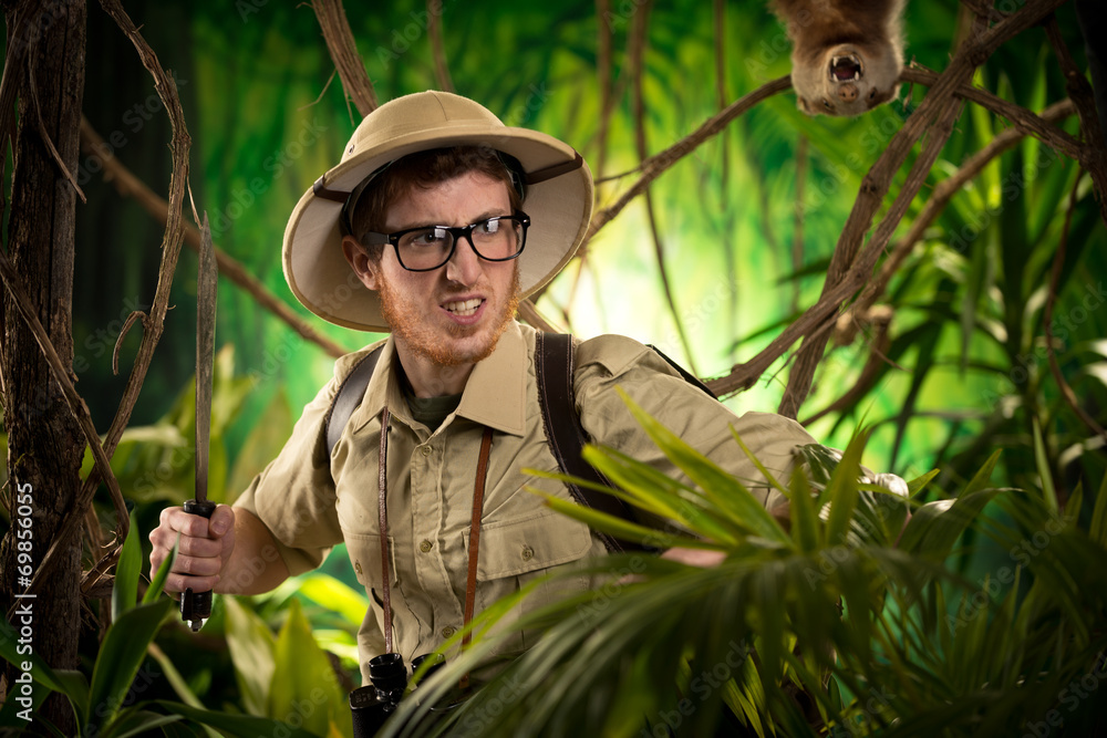 Aggressive adventurer exploring jungle Stock Photo | Adobe Stock