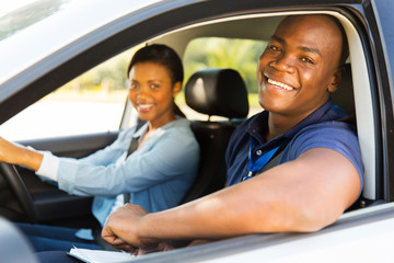 Poster - male african american driving instructor and student driver