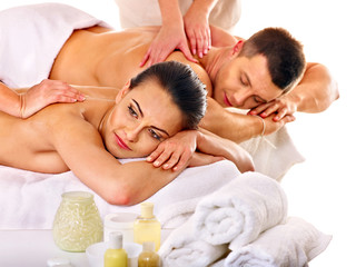 Couple relaxing in spa.