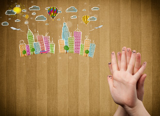 Fototapete - Happy smiley fingers looking at colorful handrawn cityscape