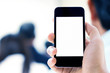 © BrightSpace - Close up of hands man using his cell phone,blurred background