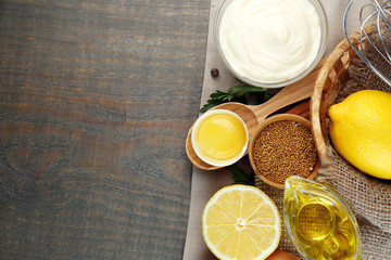 Wall Mural - Mayonnaise ingredients on wooden background