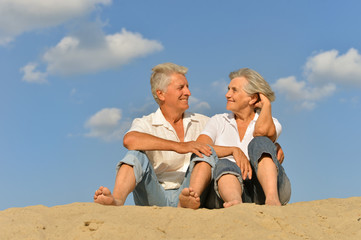 Wall Mural - Happy mature couple barefoot