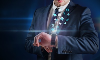 Aufkleber - Composite image of businessman using hologram watch