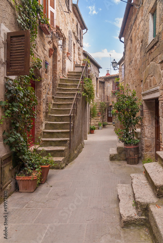 Naklejka ścienna Nooks and crannies in the Tuscan town, Italy