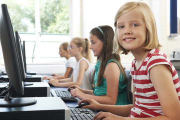 Wall Mural - Group Of Female Elementary School Children In Computer Class