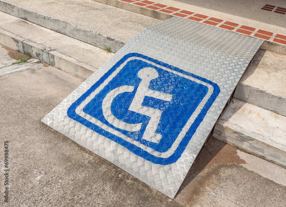 Ramped access, using wheelchair ramp with information sign on fl - obrazy, fototapety, plakaty 