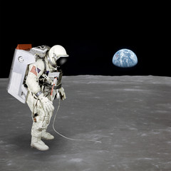Wall Mural - High quality isolated composite astronaut walking on moon; eleme