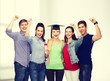 © Syda Productions - group of standing smiling students with diploma