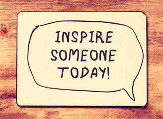 Wall Mural - vintage board with the phrase inspire someone today! written on 