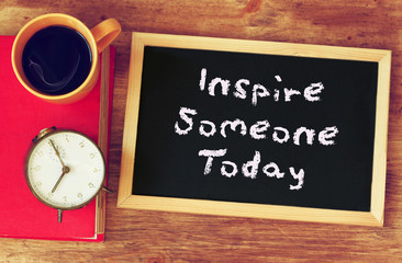 Wall Mural - blackboard with the phrase inspire someone today