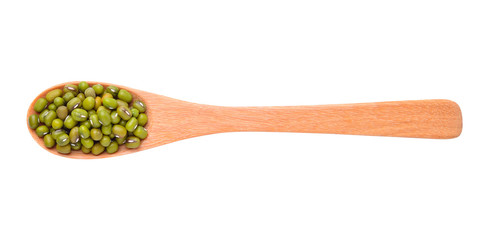 Wall Mural - raw mung beans in wooden spoon over white background