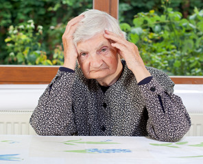 Canvas Print - Unhappy elderly woman