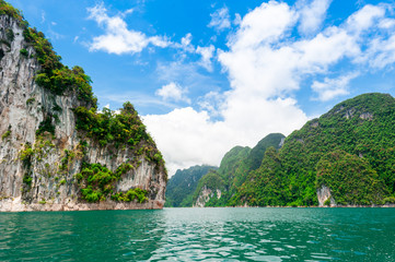 Wall Mural - beautiful scene of blue green clear water with rock mountain in