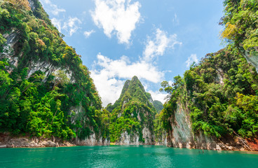 Wall Mural - beautiful scene of blue green clear water with rock mountain in