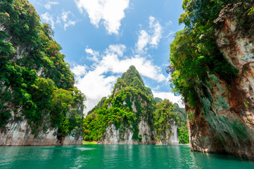 Wall Mural - beautiful scene of blue green clear water with rock mountain in